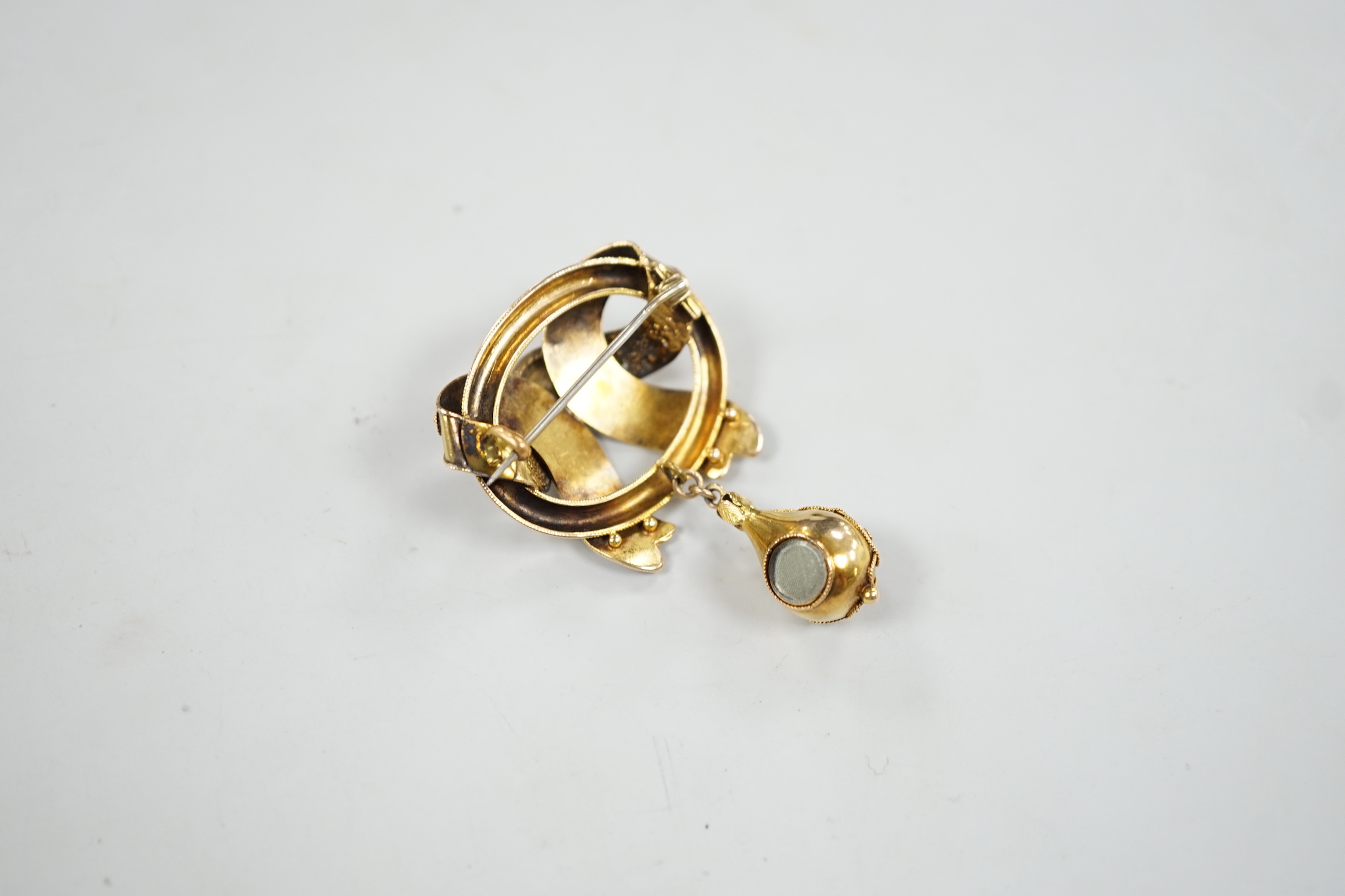 A Victorian yellow metal and foil backed garnet? set cannetile work drop brooch, 56mm, gross weight 12.7 grams.